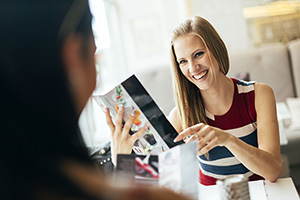 women and restaurant menu